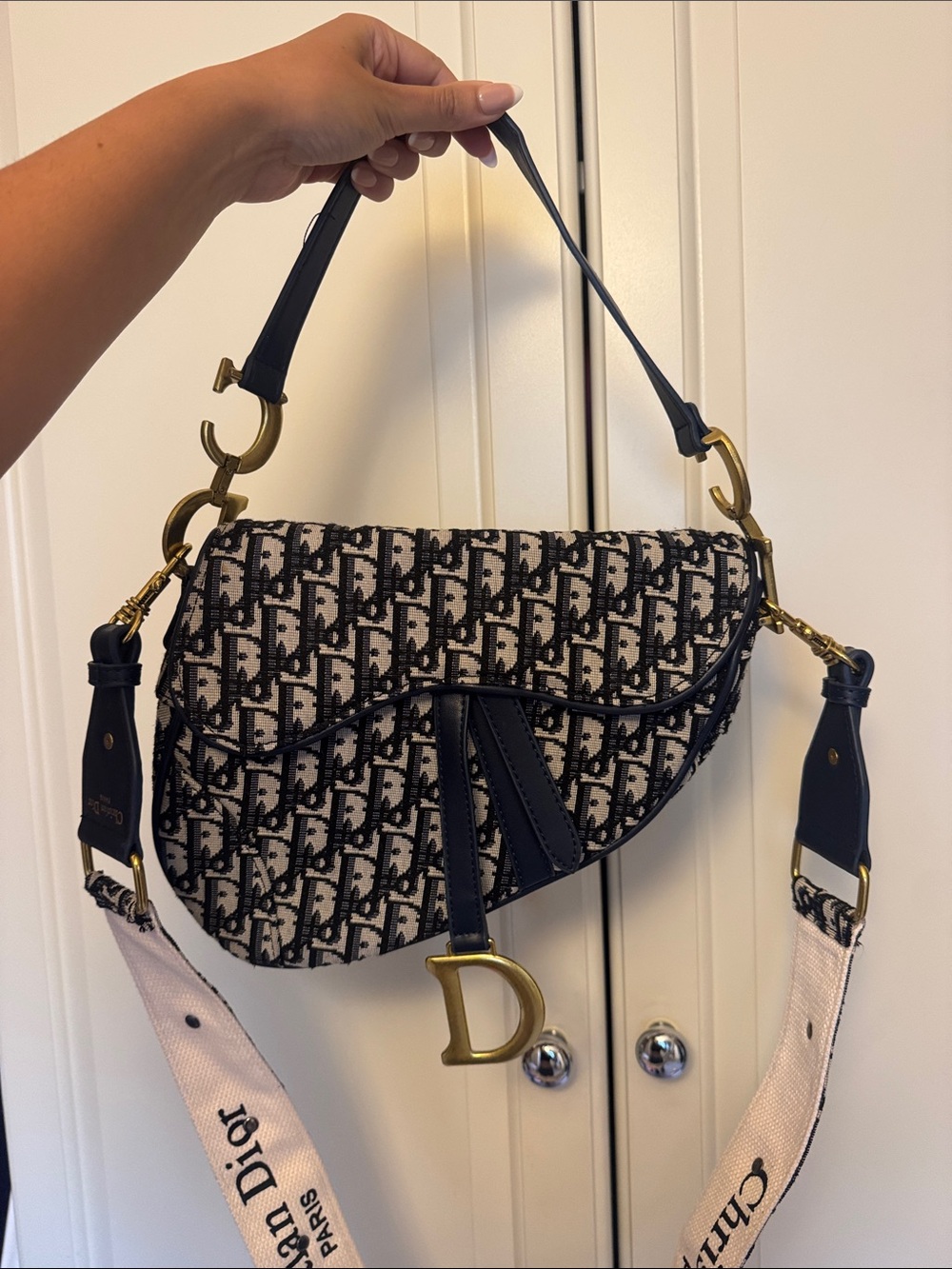 Designer-Inspired Blue 
and Cream Saddle Bag with Gold Hardware